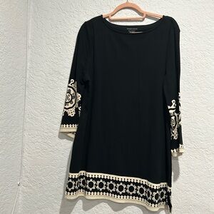 Color black w/ beige designs beautiful used but good condition size XL